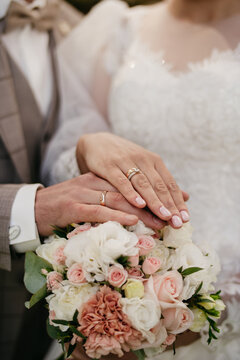 Hand in hand. Certification and marriage proposal. Gentle manicure on beautiful hands