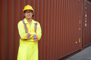 Confident cross arm Asia logistic engineer man worker or foreman working at container site	 - 768518766
