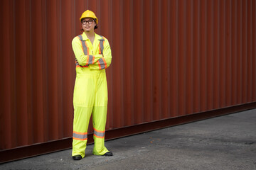 Confident cross arm Asia logistic engineer man worker or foreman working at container site	 - 768518778