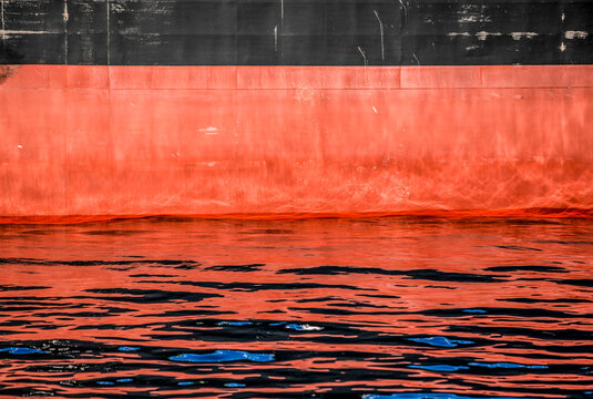 Ship hull reflected in the water