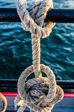 Rope tied into a knot on a ship