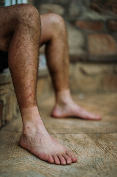 dirty grime covered legs and sock line on cyclist, Rwanda