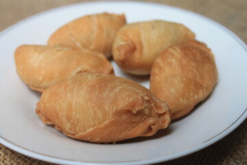 Traditional Indonesian food called molen in a plate on the table