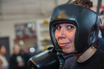 Young girls participating in a boxing clinic  at the local gym