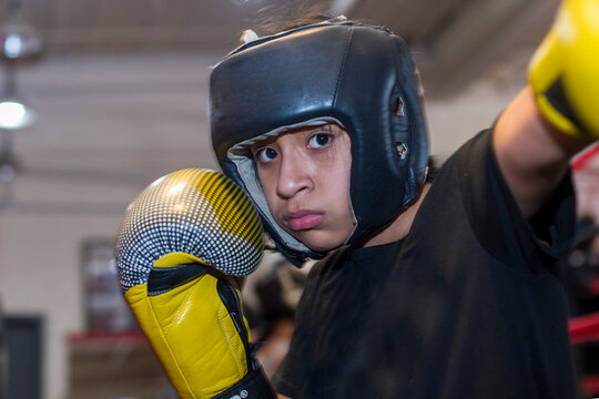 Young girls participating in a boxing clinic  at the local gym