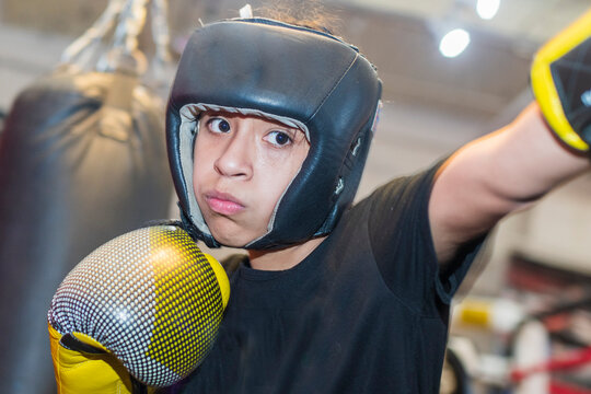 Young girls participating in a boxing clinic  at the local gym