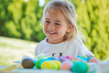 Happy Baby Coloring Easter Eggs - 768525169
