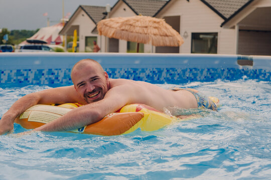 A man having fun in a pool