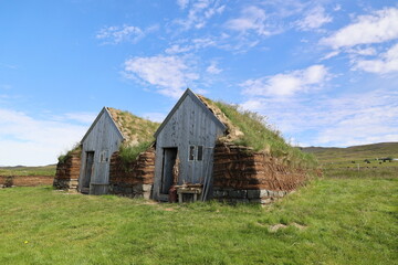 Obraz premium Traditional Icelandic turf houses-a sod house is a permanent dwelling in the art of an earth house