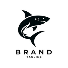 Obraz premium The shark logo is ideal for Clothing or Surfing Gear Brands, Sports Teams, Marine Conservation Organizations, Sea Tourism Companies, Energy Drink or Health Supplement Brands, Gaming