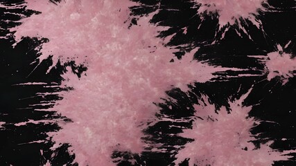 Pink spray pattern on black grunge background	