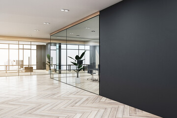 Sleek office design with reflective glass walls and herringbone wooden flooring. 3D Rendering - 768545540