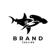 Fototapeta premium The shark logo is ideal for Clothing or Surfing Gear Brands, Sports Teams, Marine Conservation Organizations, Sea Tourism Companies, Energy Drink or Health Supplement Brands, Gaming
