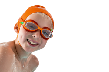 Funny boy looking at camera with swimming pool cap and orange swimming pool goggles.