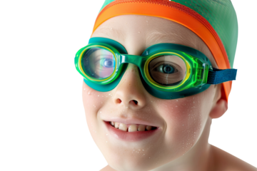 Smiling kid with green and orange swimming pool cap and goggles. Summer concept.
