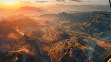 Selbstklebende Fototapeten Aerial Landscapes with Dust Textures: Give aerial landscape shots a new dimension by incorporating grainy dust textures, emphasizing the vastness and untouched quality of the terrain. © Exnoi