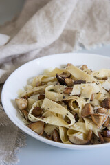 A dish of pasta with mushrooms, a comforting staple food