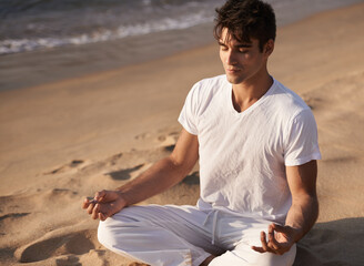 Meditate, lotus and man on beach, mindfulness and zen with fresh air for calm and eyes closed...