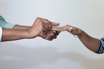 Hands Sealing Love in Ring Exchange