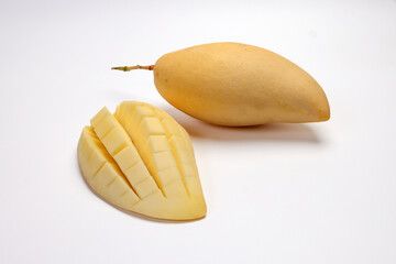 Yellow mango tropical fruit whole sliced cube diced half on white background