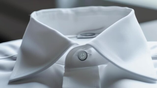 Blank mockup of a classic buttondown shirt with a pointed collar suitable for embroidered monograms or company logos.