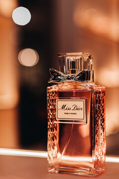 Miss Dior luxury perfume glass bottle of on a stand. It was founded in 1946 by French fashion designer Christian Dior.