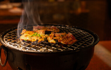 Korean barbecue. Korean cuisine of grilling pork - 768587160