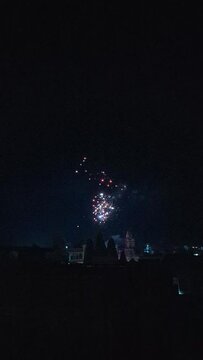 Slow motion of firecrackers bursting against a dark background during Diwali celebrations in Khambhat, India