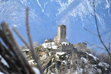 Graines Castle, above the town of Brusson, dominates the snow-capped valley