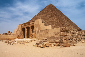 Cairo, Egypt. Pyramid complex on Giza plateau. Pyramid of Cheops, largest of Egyptian pyramids,...