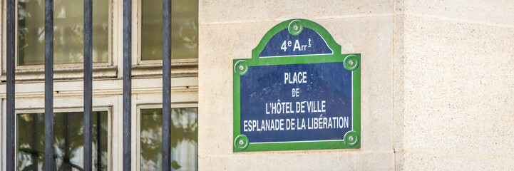 Place de l'Hotel de Ville, Esplanade de la Liberation sign on the city hall square of Paris, France - obrazy, fototapety, plakaty