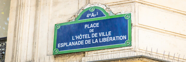 Place de l'Hotel de Ville, Esplanade de la Liberation sign on the city hall square of Paris, France