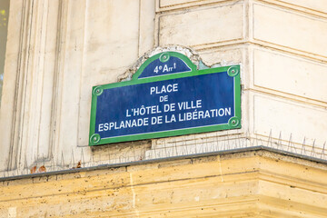 Place de l'Hotel de Ville, Esplanade de la Liberation sign on the city hall square of Paris, France - 768593921