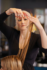Woman, hairdresser and customer with scissors at hair salon for grooming, styling tools and...