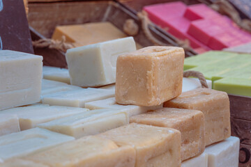 Assortment of handmade soaps from Marseille on market in Aix-en-Provence, 