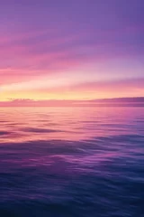 Foto op Plexiglas Tranquil seascape with smooth water surface and a vibrant sunset sky transitioning from pink to purple hues, reflecting on the calm ocean. © ChubbyCat