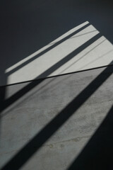 a sunny textured shadow on the studio floor