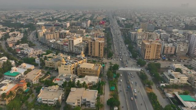 Drone bird's eye view over the shahrah-e-faisal karachi road in karachi
