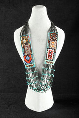 women's necklace made of colorful beads - 768636995