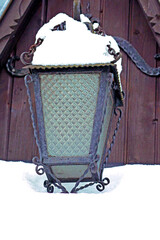 Lantern under the snow