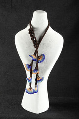 women's necklace made of colorful beads - 768638594