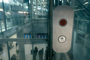 elevator buttons for blind person in modern building, braille lift buttons, airport terminal