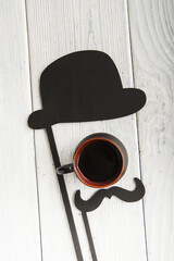 Greeting card Happy Father's Day. Mustache, hat, pipe, coffee.