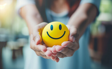 Embracing Positivity: Woman Holding a Happy Smile Sphere