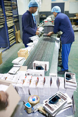 People, printing factory and paper production or manufacturing process for flyer, newspaper or...