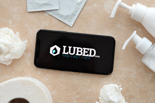 KYIV, UKRAINE - JANUARY 23, 2024 Lubed adult content website logo on display of iPhone 12 Pro smartphone