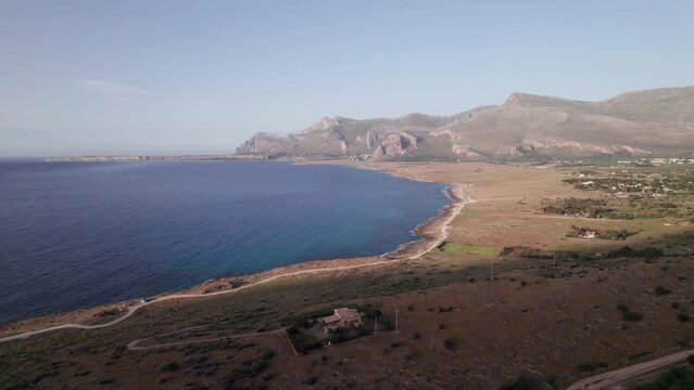 Aerial view drone of sea cost. Flying over the sea surrounded by mountains