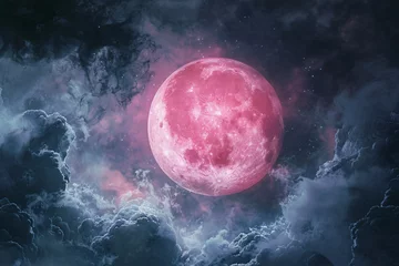 Fotobehang a pink moon in the sky © Georgeta