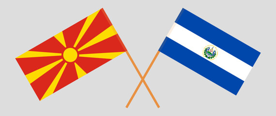 Crossed flags of North Macedonia and El Salvador. Official colors. Correct proportion