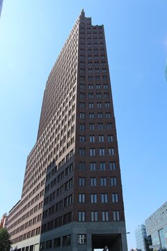 The modernist skyscraper Kollhoff tower at potsdam square in berlin as seen from the ground